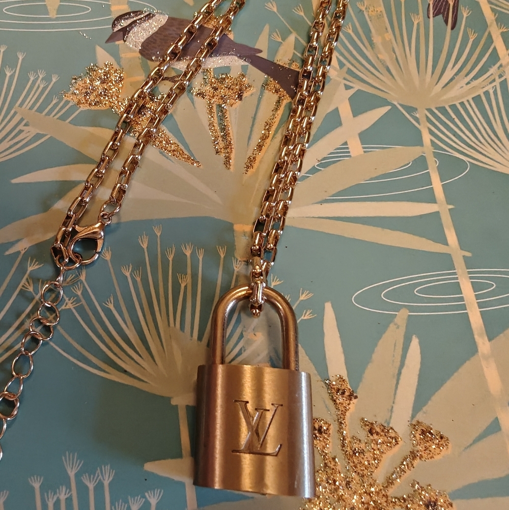 LV Monogram Lock Necklace.